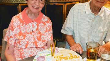 This June 2019 photo provided by Leah Smith shows Les and Freda Austin of Jackson, of Michigan, pose for a photo at a birthday party. The Michigan couple, who family members say did everything together for 70 years up to their final breaths, died 20 minutes apart in the same hospice care on Dec. 6, MLive.com reports. (Leah Smith via AP)