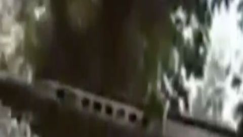 VIDEO: Narcos del CJNG se muestran en vehículo artillado y arsenal en Michoacán