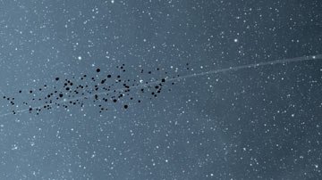 Representación artística de Júpiter y los asteroides troyanos.