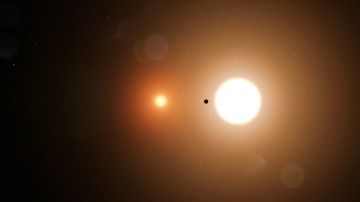 El Planeta TOI 1338 b se muestra en órbita alrededor de dos estrellas en una ilustración sin fecha publicada por el Centro de Vuelo Espacial Goddard de la NASA.