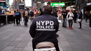 NEW YORK, NEW YORK - NOVEMBER 05: A police officer sits on a scooter in Times Square on November 05, 2019 in New York City. Following a turbulent three-year run as Police Commissioner, James O’Neill announced yesterday his resignation and is to be replaced by Dermot Shea, the current chief of detectives. O'Neill's departure comes months after the firing of former officer Daniel Pantaleo over actions he took in the death of Eric Garner on Staten Island. The NYPD, the nations largest police department, is also facing a crisis of suicides amongst officers with 10 current officers having taken their lives this year alone. (Photo by Spencer Platt/Getty Images)