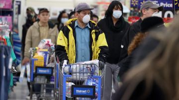 Walmart coronavirus clientes distanciamiento social supermercados compras