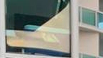 Ben Katz y Jamie Webner en el balcón de su apartamento de Miami.