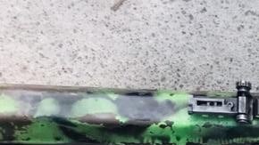 Armas decomisadas tras el enfrentamiento en 'La Huerta', Michoacán.