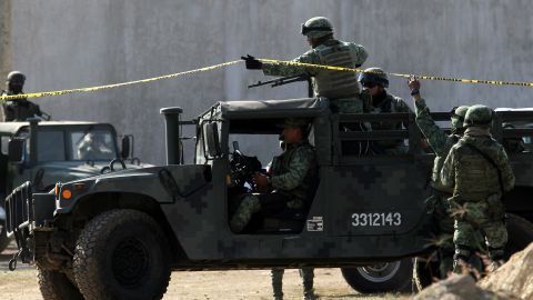 MEXICO-VIOLENCE-CRIME-MASS GRAVE
Soldiers secure the area where a clandestine mass grave was discovered at Lomas del Vergel in the community of Zapopan, Jalisco state, Mexico, on January 16, 2020. - Nearly 2,500 murders were reported between January and November in Jalisco -- a state hard-hit by violence linked to organized crime -- state authorities have said. (Photo by Ulises Ruiz / AFP) (Photo by ULISES RUIZ/AFP via Getty Images)