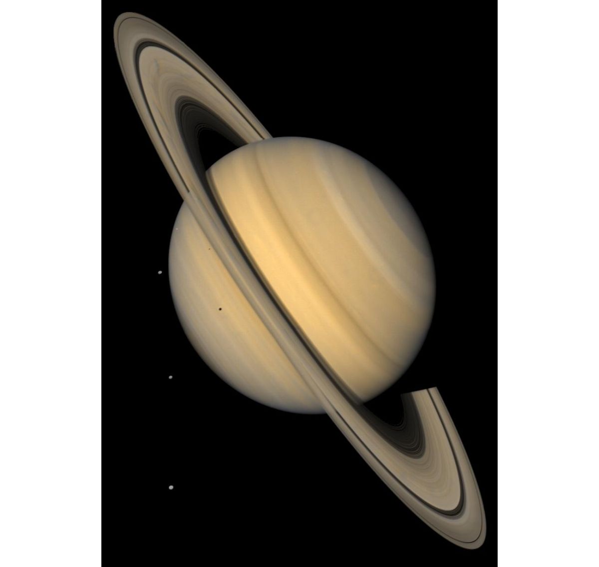 Saturno y 4 de sus lunas en color natural.