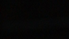 Michael Jackson con una imagen de Tommy Mottola.