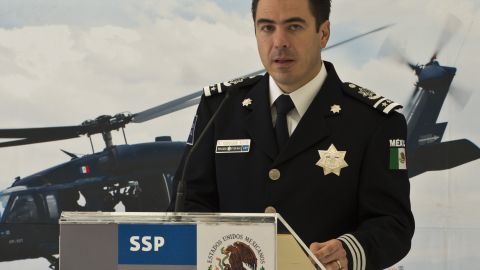 Luis Cardenas Palomino, head of the Regional Safety Division of the Mexican Federal Police, speaks during a press conference prior to the presentation to the press of  David Rosales Guzman, aka "Commander Devil",  alleged member of the Gulf cartel at the Police Command Centre in Mexico City on September 02, 2012. According to the Mexican authorities , Rosales Guzman  was in charge of the illegal drug trafficking In Monterrey, north Mexico. AFP PHOTO/OMAR TORRES        (Photo credit should read OMAR TORRES/AFP/GettyImages)