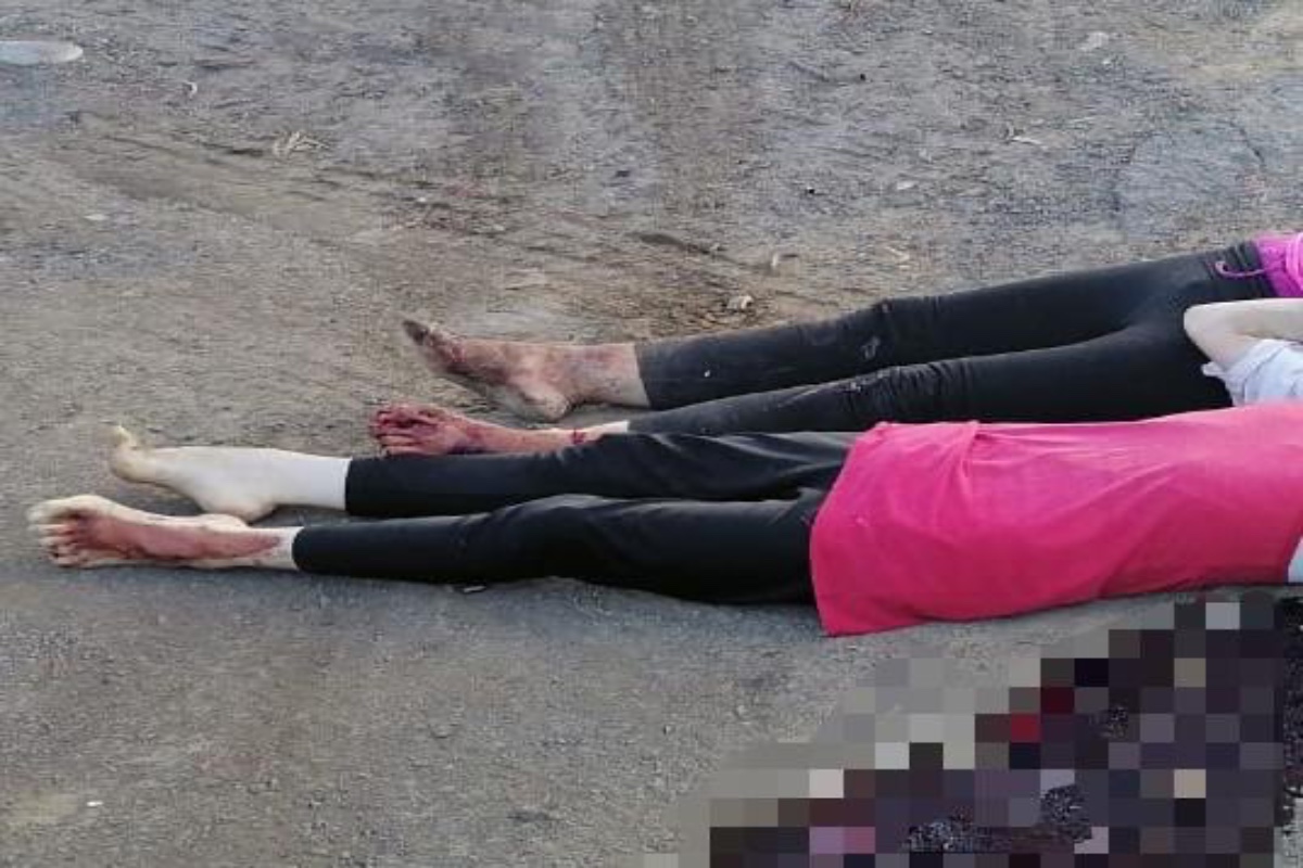 FOTO: Con tiro de gracia en la cabeza, matan a mujer y a niña; las dejan en desolada carretera