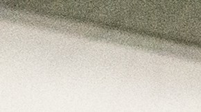 Enfermera con todo su equipo de protección personal en la habitación de un paciente con coronavirus.