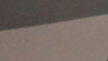 TOPSHOT - Pediatrician Raul Seminario assesses the medical condition of an infant infected with COVID-19 at the nursery ward of the of Felipe Urriola Hospital in Iquitos, Peru on July 8, 2020. - Among the patients with COVID-19 in Peru are 24 children in the hospital in Iquitos, the largest city in the Peruvian Amazon, which was the first region in the country to feel the rigours of the pandemic. (Photo by Cesar Von BANCELS / AFP) (Photo by CESAR VON BANCELS/AFP via Getty Images)