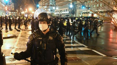 WASHINGTON, DC - DECEMBER 12:  A police officer in riot gear stands guard as protesters gather near Black Lives Matter Plaza during a protest on December 12, 2020 in Washington, DC. Thousands of protesters who refuse to accept that President-elect Joe Biden won the election are rallying ahead of the electoral college vote to make Trump's 306-to-232 loss official.  
Supporters Of President Trump Gather In D.C. To Protest Election Results
(Photo by Stephanie Keith/Getty Images)