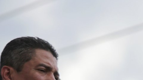 El presidente de Honduras, Juan Orlando Hernández (c).