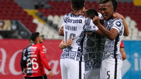 América festejando un gol contra Atlas.