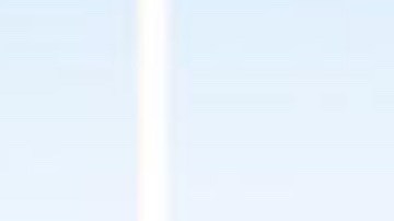 Migrantes en la frontera entre Tijuana y San Diego.