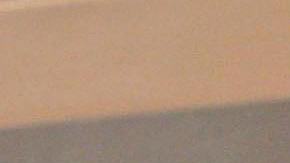 Fidel y Raúl Castro durante una sesión de la Asamblea Nacional en 2003.