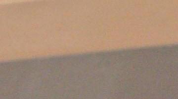 Fidel y Raúl Castro durante una sesión de la Asamblea Nacional en 2003.