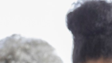 Happy couple volunteer in community food bank