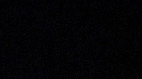 Momento del desplome de la torre Sur que queda en pie.