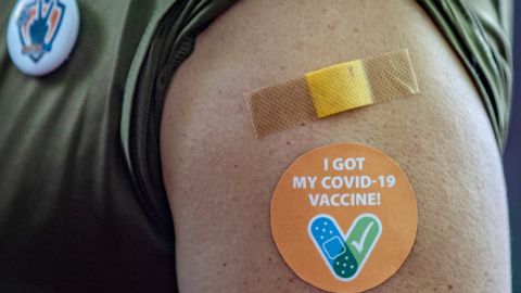 MANILA, PHILIPPINES - MARCH 02: A military officer is seen wearing a sticker on his arm after being vaccinated with Sinovac Biotech's CoronaVac, at the Philippine Army headquarters in Fort Bonifacio on March 2, 2021 in Taguig, Metro Manila, Philippines. The Philippines has begun its vaccination program after receiving 600,000 doses of Sinovac Biotech's CoronaVac vaccines donated by the Chinese government. The Philippines is the last country in the ASEAN to receive its official supply of coronavirus vaccines. (Photo by Ezra Acayan/Getty Images)