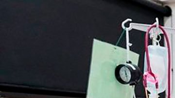 Kwek Yu Xuan junto a sus padres.