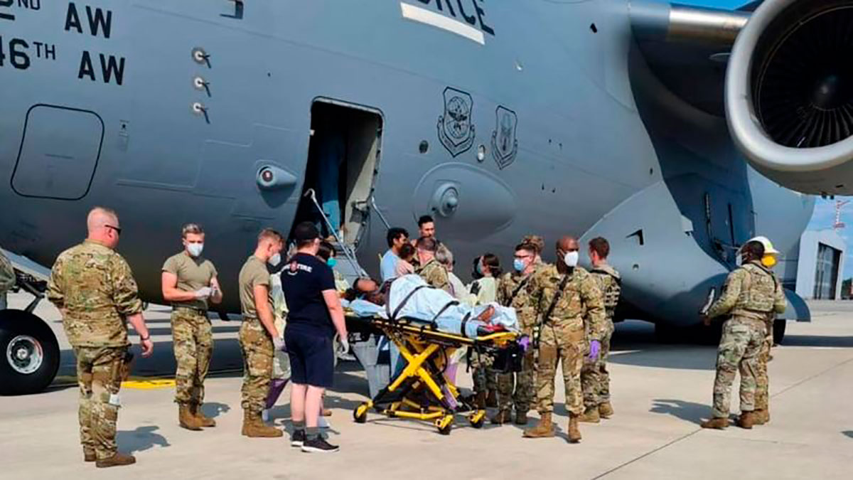 An Afghan woman gives birth on a US evacuation plane