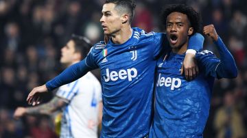 Ronaldo y Cuadrado en un partido co n la Juventus de Turín.