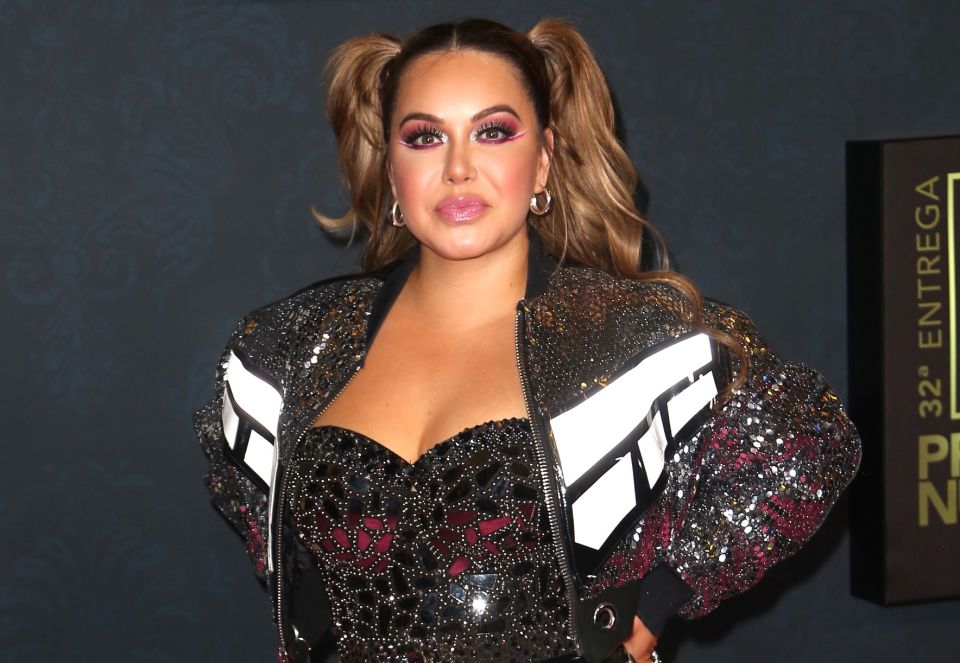 Chiquis Rivera shows off her rear in biker shorts, surprising her pet