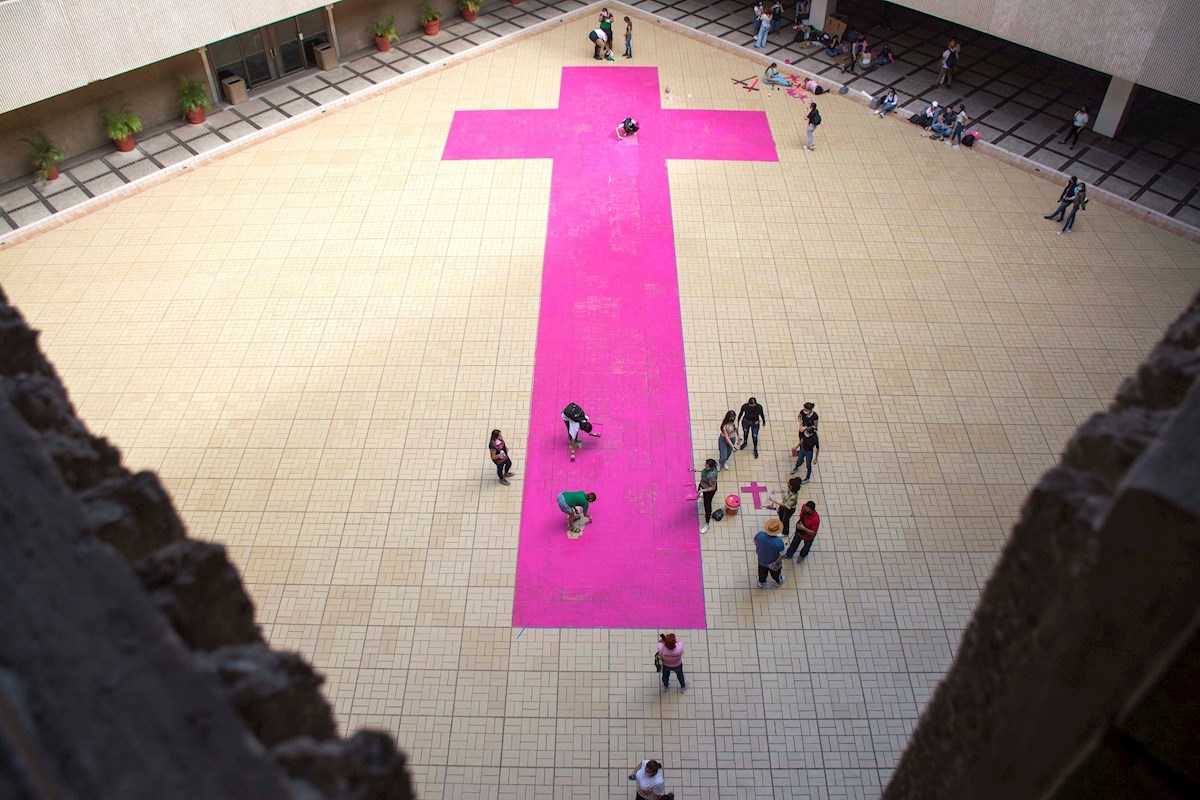 Huge pink cross painted in Sinaloa Mexico in protest of femicides