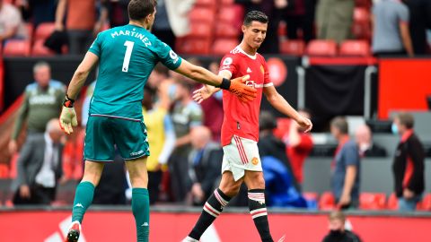 Cristiano Ronaldo y Dibu Martínez