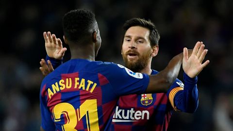 Ansu fati y Lionel Messi