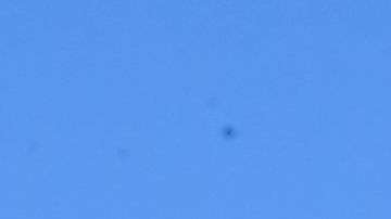 TOPSHOT - People walk past the name Rodney King seen on a chain-link fence surrounding Silver Lake Reservoir in Los Angeles, on June 9, 2020, where a new art installation protesting police brutality spells out, in colourful woven fabric, the names of unarmed African Americans who have been killed by police. - King, who was violently beaten by LAPD officers during his arrest for high speed drunk driving, became a writer after surving police brutality and died in June, 2012 from alcohol poisoning. (Photo by Frederic J. BROWN / AFP) (Photo by FREDERIC J. BROWN/AFP via Getty Images)