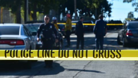 Police guard a roadblock near Salvadore Castro Middle School in Los Angeles, California on February 1, 2018, where two students were wounded, one critically, in a school shooting. - Two 15-year-old students in Los Angeles were shot and wounded in class Thursday, according to witnesses and local media, in the latest school shooting to hit the United States. A boy was shot in the head, while a girl was hit in the wrist, according to reports from the scene. Local news agency CNS reported that a "young woman," possibly a fellow student, had been arrested. (Photo by Frederic J. Brown / AFP) (Photo by FREDERIC J. BROWN/AFP via Getty Images)