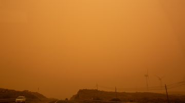Cars drive on the TF-1 highway during a sandstorm in Santa Cruz de Tenerife, on the Canary Island of Tenerife, on February 23, 2020. - Airports on Spain's Canary Islands were closed after strong winds carrying red sand from the Sahara shrouded the tourist hotspot. (Photo by DESIREE MARTIN / AFP) (Photo by DESIREE MARTIN/AFP via Getty Images)