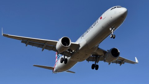 An American airlines Airbus A321-200 approaches Washington Ronald Reagan National Airport (DCA) in Arlington, Virginia on February 24, 2021. (Photo by Daniel SLIM / AFP) (Photo by DANIEL SLIM/AFP via Getty Images)