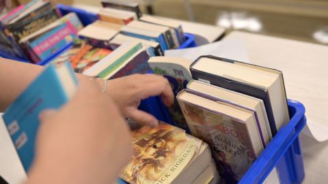 Elementary School Officials At A Public School In NYC Gather To Handout Year End Material To Students