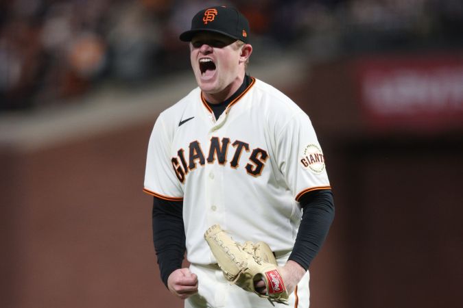AN FRANCISCO, CALIFORNIA - OCTOBER 08: Logan Webb #62 of the San Francisco Giants reacts after striking out Cody Bellinger #35 of the Los Angeles Dodgers during the seventh inning of Game 1 of the National League Division Series at Oracle Park on October 08, 2021 in San Francisco, California. (Photo by Ezra Shaw/Getty Images)