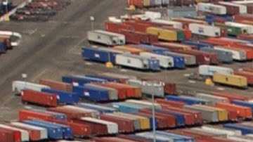 LONG BEACH, CA - OCTOBER 2: Shipping containers are left stacked in the Port of Los Angeles because of the West Coast lockout of dockworkers by shipping lines on October 2, 2002 in Long Beach, California. Hopes that federal mediation would resolve the impasse, which is costing an estimated $1 billion a day, were dashed October 1 after union representatives stormed out of a meeting after shippers showed up with armed security guards. (Photo by David McNew/Getty Images)