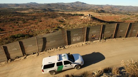 CAMPO, CA - JULY 30: US Border Patrol agents carry out special operations near the US-Mexico border fence following the first fatal shooting of a US Border Patrol agent in more than a decade on July 30, 2009 near the rural town of Campo, some 60 miles east of San Diego, California. 30-year-old agent Robert Rosas was killed on July 23 when he tracked a suspicious group of people alone in remote brushy hills north of the border in this region. Violence has been escalating in Mexico with fights between well-armed drug cartels and the army becoming common since Mexican President Felipe Calderon began his army-backed war on the cartels. Since the conflict began in late 2006, 12,800 people have been killed. Mexican officials charge that guns which are easily smuggled in from the US have flooded into Mexico where gun laws are strict. (Photo by David McNew/Getty Images)