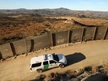 CAMPO, CA - JULY 30: US Border Patrol agents carry out special operations near the US-Mexico border fence following the first fatal shooting of a US Border Patrol agent in more than a decade on July 30, 2009 near the rural town of Campo, some 60 miles east of San Diego, California. 30-year-old agent Robert Rosas was killed on July 23 when he tracked a suspicious group of people alone in remote brushy hills north of the border in this region. Violence has been escalating in Mexico with fights between well-armed drug cartels and the army becoming common since Mexican President Felipe Calderon began his army-backed war on the cartels. Since the conflict began in late 2006, 12,800 people have been killed. Mexican officials charge that guns which are easily smuggled in from the US have flooded into Mexico where gun laws are strict. (Photo by David McNew/Getty Images)