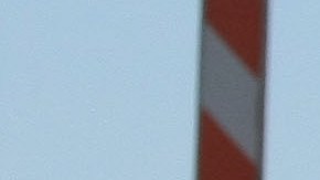 OAKLAND, CA - OCTOBER 28: California Highway Patrol officer Rick Baller stands next to his car as he guards the closed toll plaza leading to the San Francisco Bay Bridge October 28, 2009 in Oakland, California. The San Francisco Bay Bridge was abruptly closed Tuesday evening after two steel tie rods and a crossbeam from a steel saddle broke and fell onto the upper deck of the bridge landing on three vehicles and causing one person to suffer injuries. The eastern span of the bridge is undergoing seismic renovation and is expect to be completed in 2013. (Photo by Justin Sullivan/Getty Images)