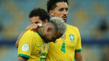 RIO DE JANEIRO, BRAZIL - JULY 10: Neymar Jr. of Brazil is comforted by teammate Marquinhos after the final of Copa America Brazil 2021 between Brazil and Argentina at Maracana Stadium on July 10, 2021 in Rio de Janeiro, Brazil. (Photo by Alexandre Schneider/Getty Images)