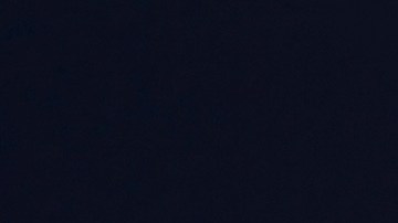 Foto de un conductor tomada desde de la parte trasera de la cabina