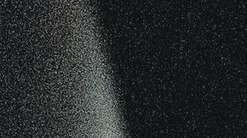 Foto de un conductor tomada desde la parte trasera del auto