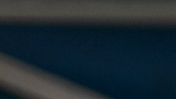 A cook prepares tacos at a street vending stand in the Pinata District in Downtown Los Angeles on March 23, 2019. - On January 1, 2019, the Safe Vending Act (SB946) went into effect in the state of California prohibiting the arrest or finning of street vendors and leaving to municipalities the power to establish permits, sanitation and security issues. The Los Angeles County has set a year to negotiate with vendors the terms on which the law is going to be applied. Some 50,000 street vendors are estimated to work in Los Angeles, a $504 million industry according to a 2015 study by the Economic Roundtable. The LA County issued a municipal ordinance that designates specific areas where the vendors must operate. The ordinance does not include areas such as Memorial Coliseum, the Staples Center, Dodger Stadium, Rose Bowl Stadium and the Hollywood Walk of Fame. Street vendors have mixed feelings about the legalization of their work. At the same time they feel freed of being against the law and harassed by police giving them tickets and seizing their goods; they are concerned about having to abide to health regulations, permits and limited areas. (Photo by Agustin PAULLIER / AFP) (Photo credit should read AGUSTIN PAULLIER/AFP via Getty Images)