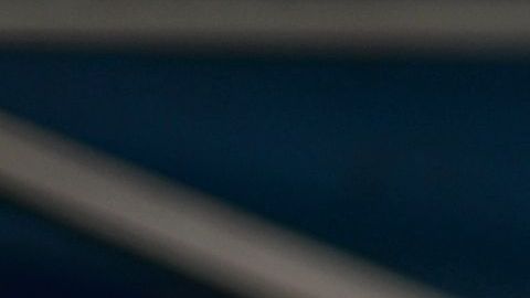 A cook prepares tacos at a street vending stand in the Pinata District in Downtown Los Angeles on March 23, 2019. - On January 1, 2019, the Safe Vending Act (SB946) went into effect in the state of California prohibiting the arrest or finning of street vendors and leaving to municipalities the power to establish permits, sanitation and security issues. The Los Angeles County has set a year to negotiate with vendors the terms on which the law is going to be applied. Some 50,000 street vendors are estimated to work in Los Angeles, a $504 million industry according to a 2015 study by the Economic Roundtable. The LA County issued a municipal ordinance that designates specific areas where the vendors must operate. The ordinance does not include areas such as Memorial Coliseum, the Staples Center, Dodger Stadium, Rose Bowl Stadium and the Hollywood Walk of Fame. Street vendors have mixed feelings about the legalization of their work. At the same time they feel freed of being against the law and harassed by police giving them tickets and seizing their goods; they are concerned about having to abide to health regulations, permits and limited areas. (Photo by Agustin PAULLIER / AFP) (Photo credit should read AGUSTIN PAULLIER/AFP via Getty Images)
