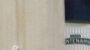 LOS ANGELES, CALIFORNIA - APRIL 04: Cashiers wear face masks as they stand behind newly installed plexiglass barriers for protection in a liquor store amid the coronavirus pandemic on April 4, 2020 in Los Angeles, California. The U.S. COVID-19 death toll has now surpassed 8,000. (Photo by Mario Tama/Getty Images)