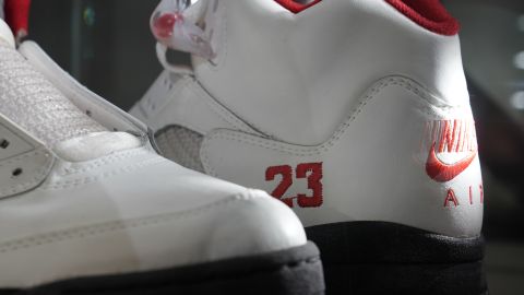 Air Jordan 5 Fire Red, Player Exclusive Sneaker,on display during a press preview July 24, 2020 at Christie's New York. - Christies and Stadium Goods have partnered to offer a unique sneaker overview of Michael Jordans era-defining Chicago Bulls career. The auction is online only 30 July13 August. (Photo by TIMOTHY A. CLARY / AFP) (Photo by TIMOTHY A. CLARY/AFP via Getty Images)