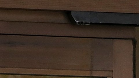 SAN FRANCISCO, CA - NOVEMBER 11: A security guard looks through a window as nurses strike outside of Kaiser Permanente hospital on November 11, 2014 in San Francisco, California. Nearly 18,000 Kaiser Permanente nurses in Northern California are staging a two-day strike amidst contract negotiations and to demand better working conditions, training and optimal safeguards for treating ebola. (Photo by Justin Sullivan/Getty Images)