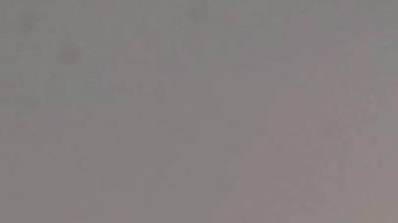 Indian father Shailesh throws up his son, Harish, at a park in Amritsar on June 19, 2016, on Father's Day, a day observed in many countries to celebrate fathers and fatherhood. / AFP / NARINDER NANU (Photo credit should read NARINDER NANU/AFP via Getty Images)